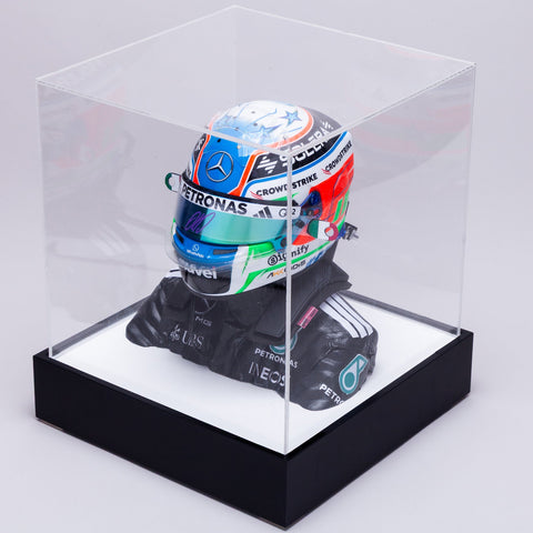 A miniature Mercedes F1 helmet Kimi Antonelli replica displayed inside a clear acrylic cube case with a black base and white interior, set against a light gray background.