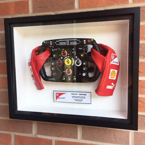 Fernando Alonso replica F2012 steering wheel in display frame
